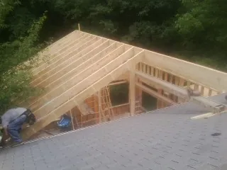 Framing a new roof addition that ties into an existing shingle roof in Somerset
